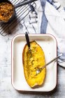 Baked spaghetti squash with vegan bolognese sauce made from lentils, leeks, and carrots — Stock Photo