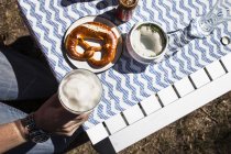 Breakfast with Bavarian veal sausage, wheat beer and pretzls — Stock Photo