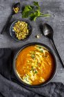 Sweet potato soup with curcuma, coriander and pistazio — Stock Photo