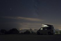 Spain, Catalonia, Costa Brava, Barcelona, camper at night, milky way — Stock Photo