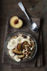 Cereals with banana and plum — Stock Photo