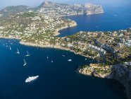 Spain, Baleares, Mallorca, Aerial view of Port d'Andratx, cliff coast — Stock Photo
