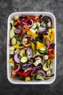 Mix of raw vegetables in casserole — Stock Photo