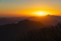 Italy, Umbria, Apennines, sunrise on mount San Vicino seen from mount Cucco Park — Stock Photo