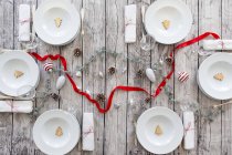 Laid table with Christmas decoration — Stock Photo