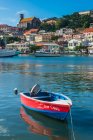 Motorboat moored in harbor of St Georges, capital of Grenada, Caribbean — Stock Photo