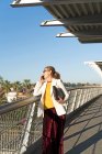 Senior businesswoman commuting in the city, using mobile phone — Stock Photo