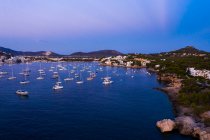 Spain, Balearic Islands, Mallorca, Calvia region, Aerial view over Costa de la Calma and Santa Ponca with sailboats in bay — Stock Photo