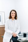 Portrait of smiling doctor in her medical practice — Stock Photo