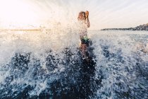 Boy playing in the water at the seafront, Adeje, Tenerife, Canarian Islands, Spain — Stock Photo