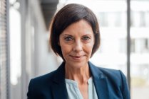 Confident female entrepreneur at office — Stock Photo
