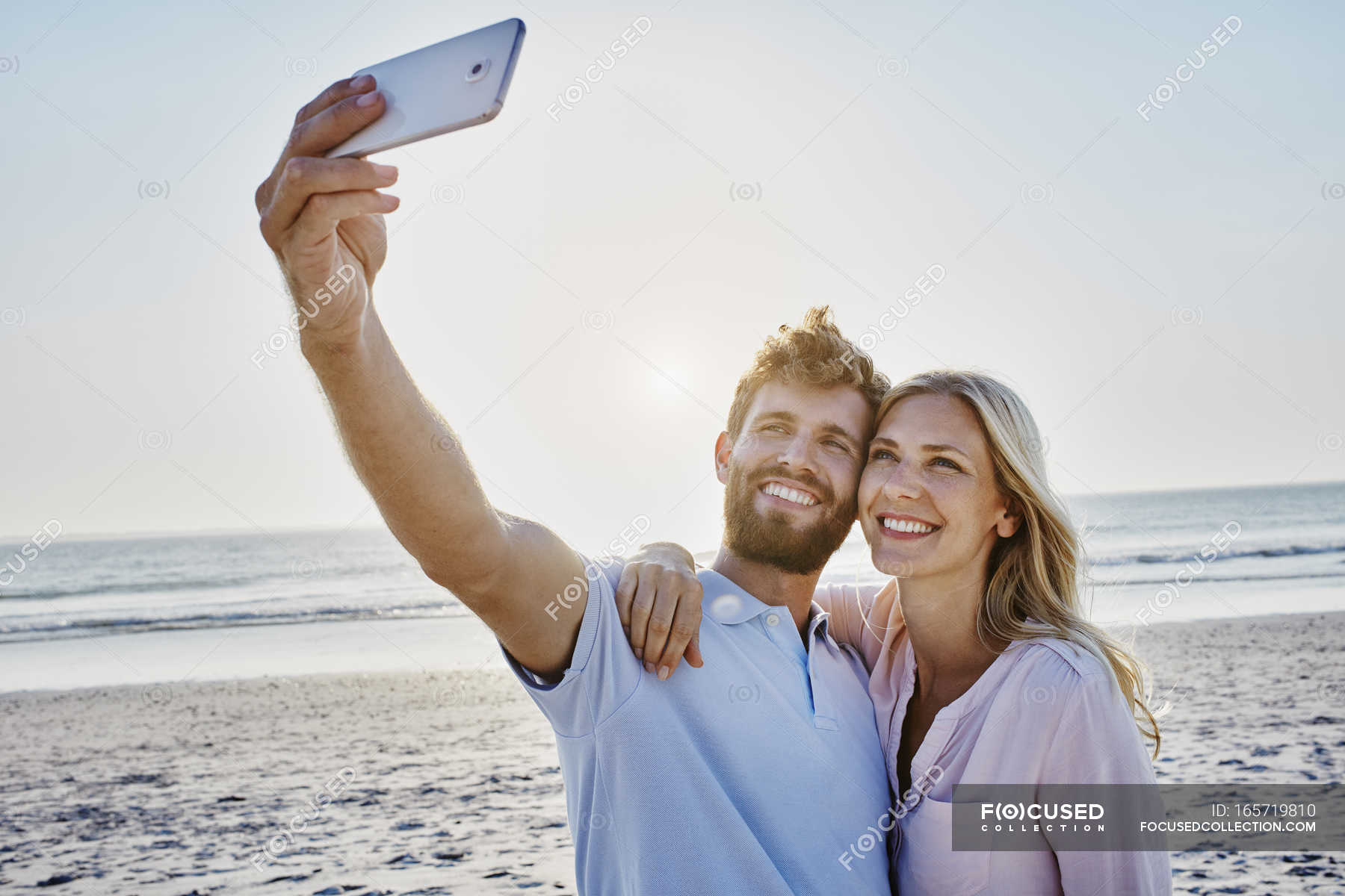 Couple Taking Selfie On Beach Nature Woman Stock Photo
