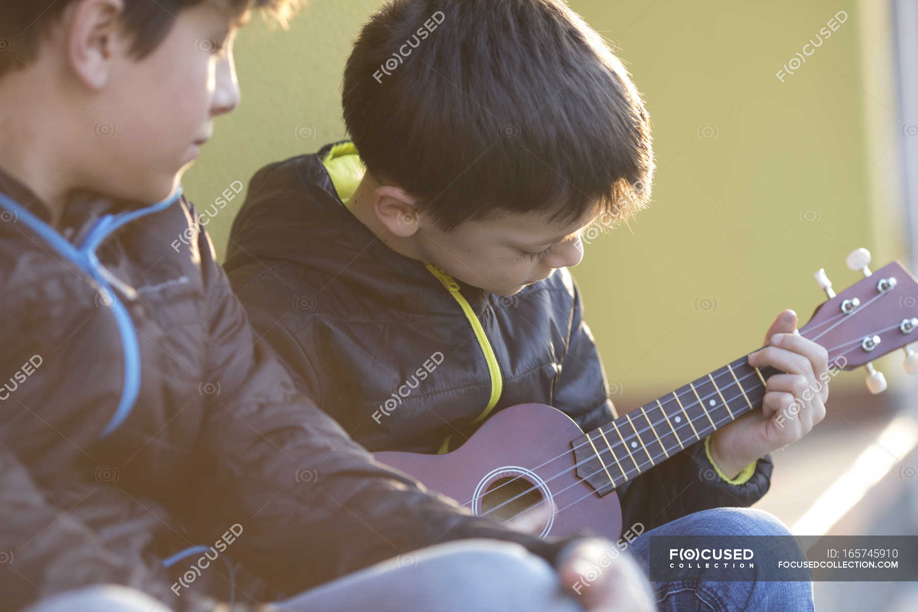 Boy Playing Ukulele Music Friend Stock Photo 165745910   Focused 165745910 Stock Photo Boy Playing Ukulele 