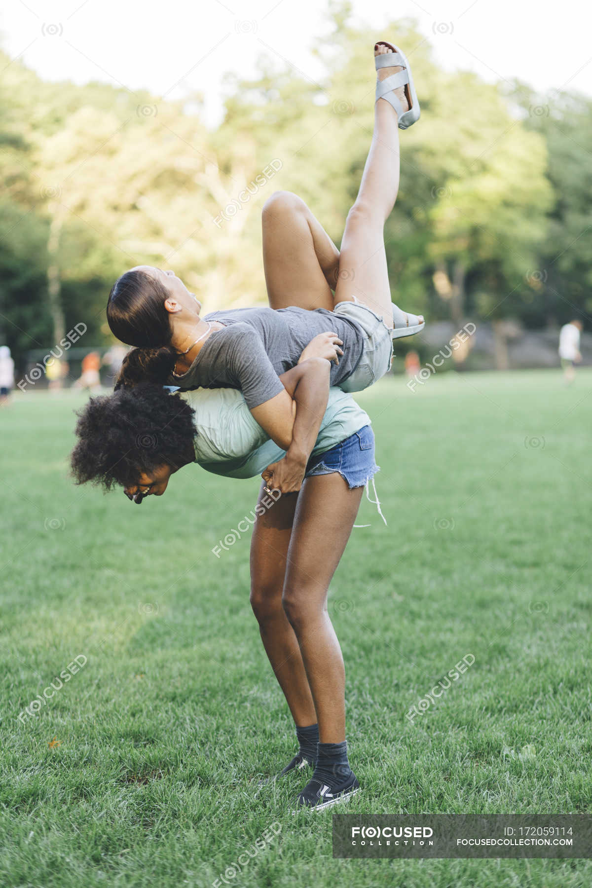 Beautiful Young Girl Giving Piggyback Ride To Stock Photo - Image of  beauty, good: 43889816