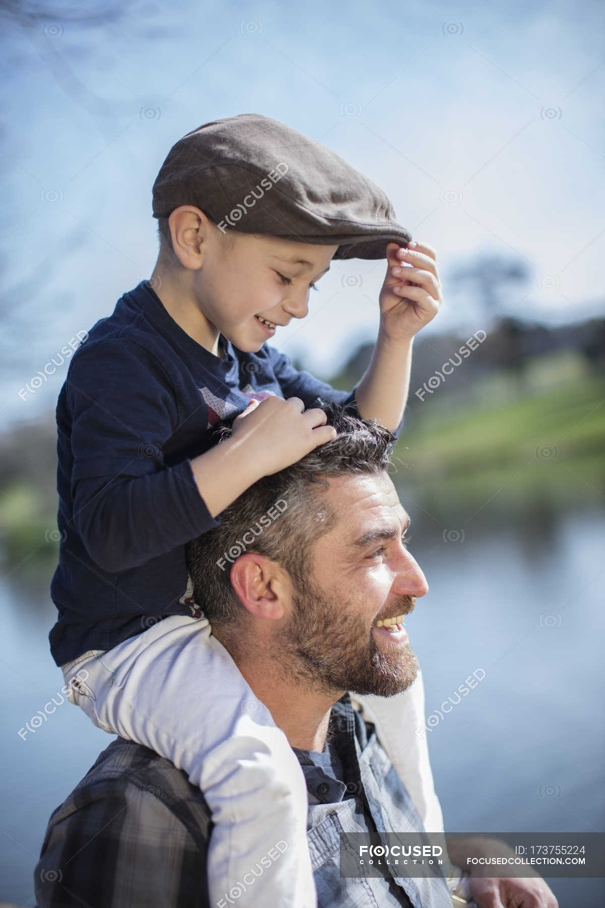 Father Carrying His Son On Shoulders Leisure Fun Stock Photo 173755224