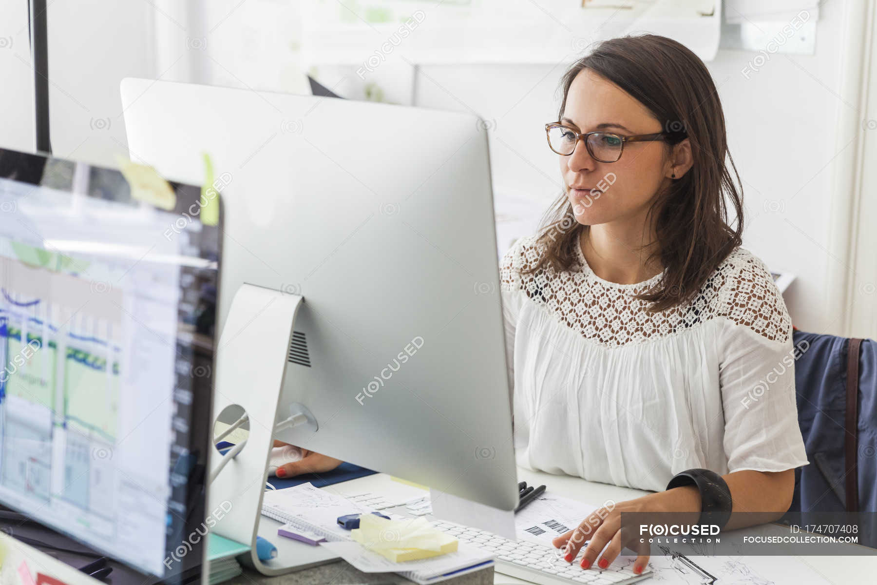Landscape architect working with computer at desk — person, spectacles -  Stock Photo | #174707408