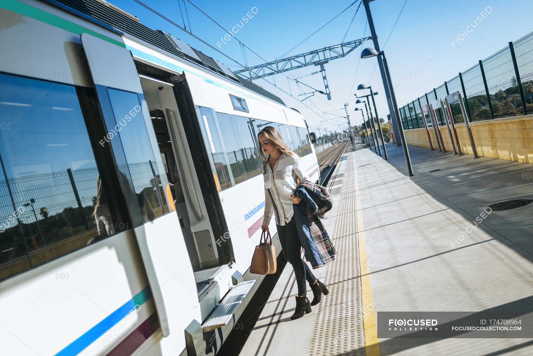 Attractive Caucasian Woman Entering A Train Traffic Female Stock Photo 174708964