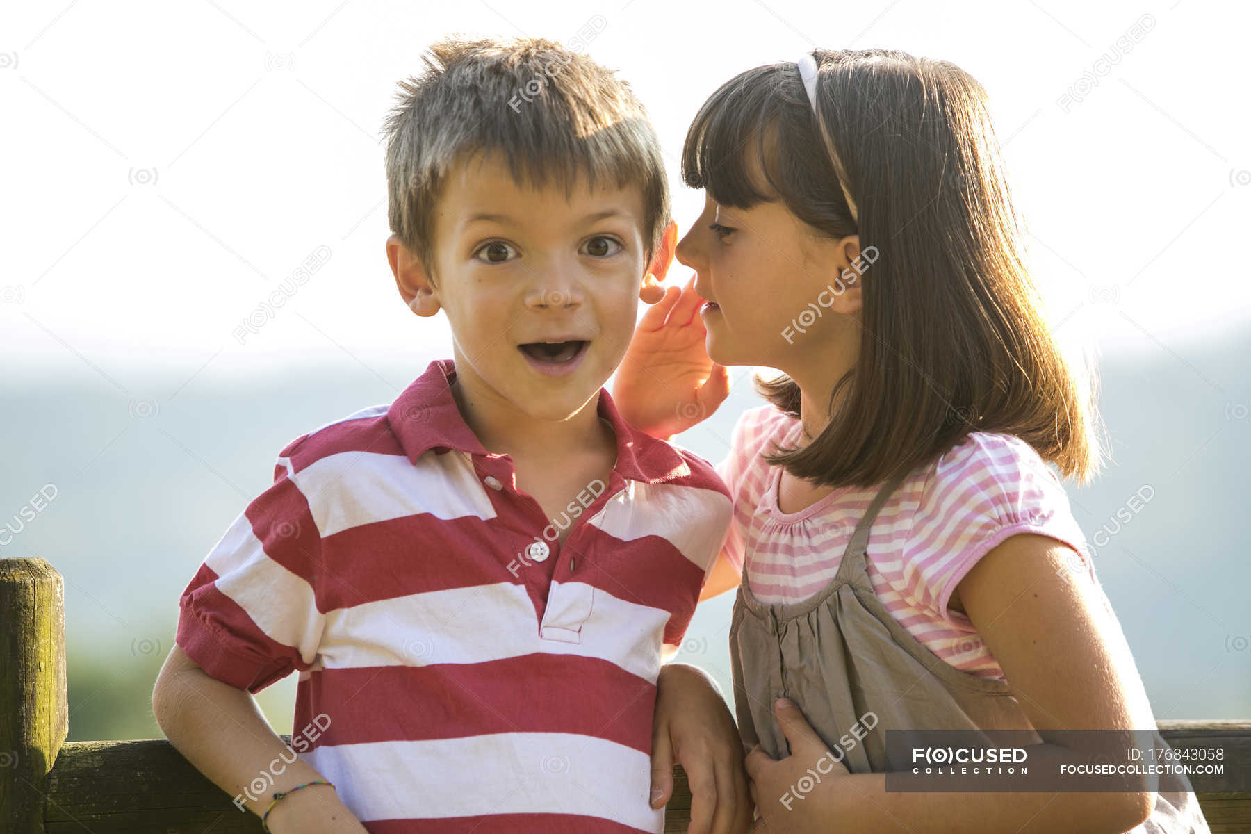 Little Girl Whispering Secret In Amazed Boy Ear Amazement Best