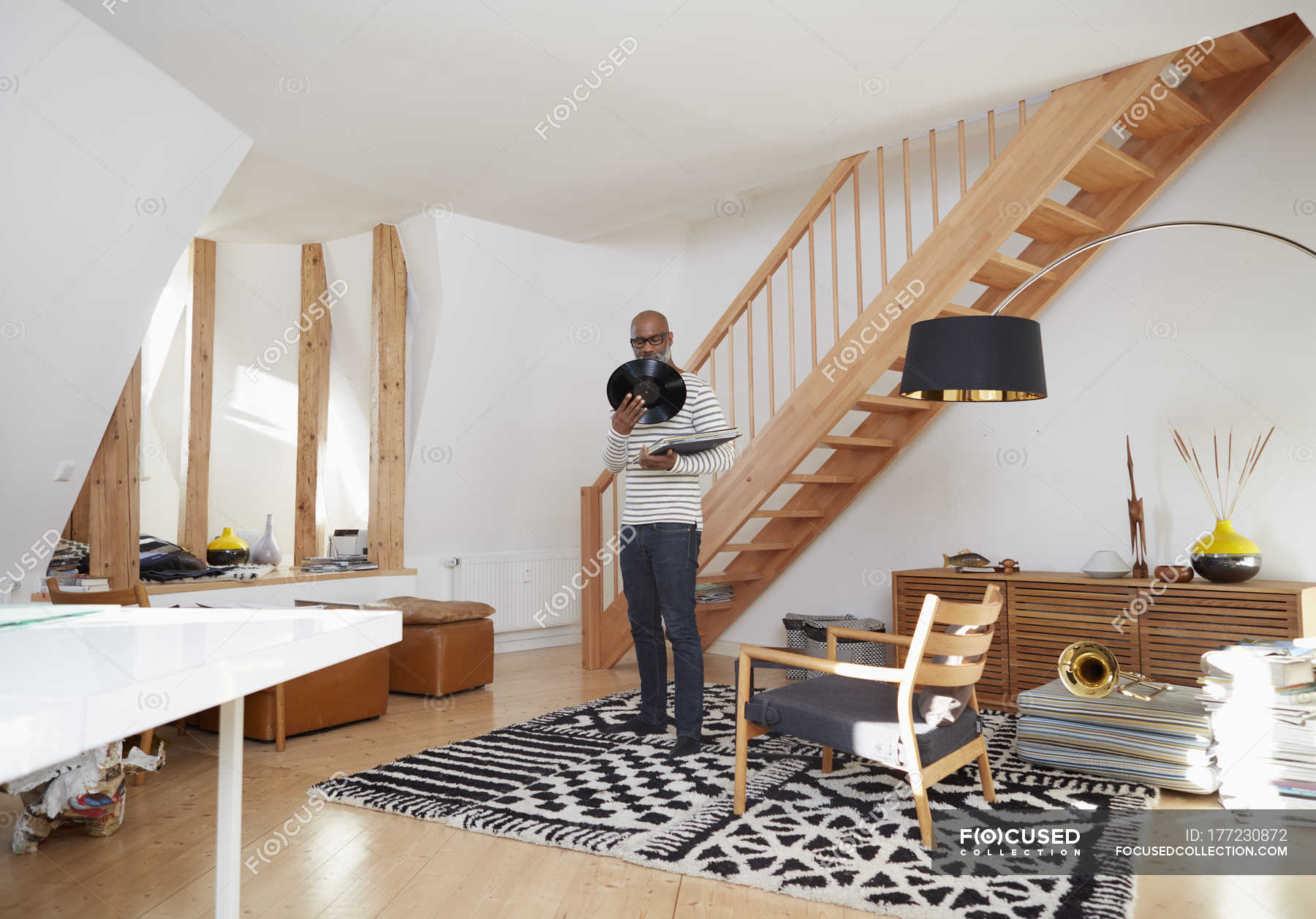 man standing in living room