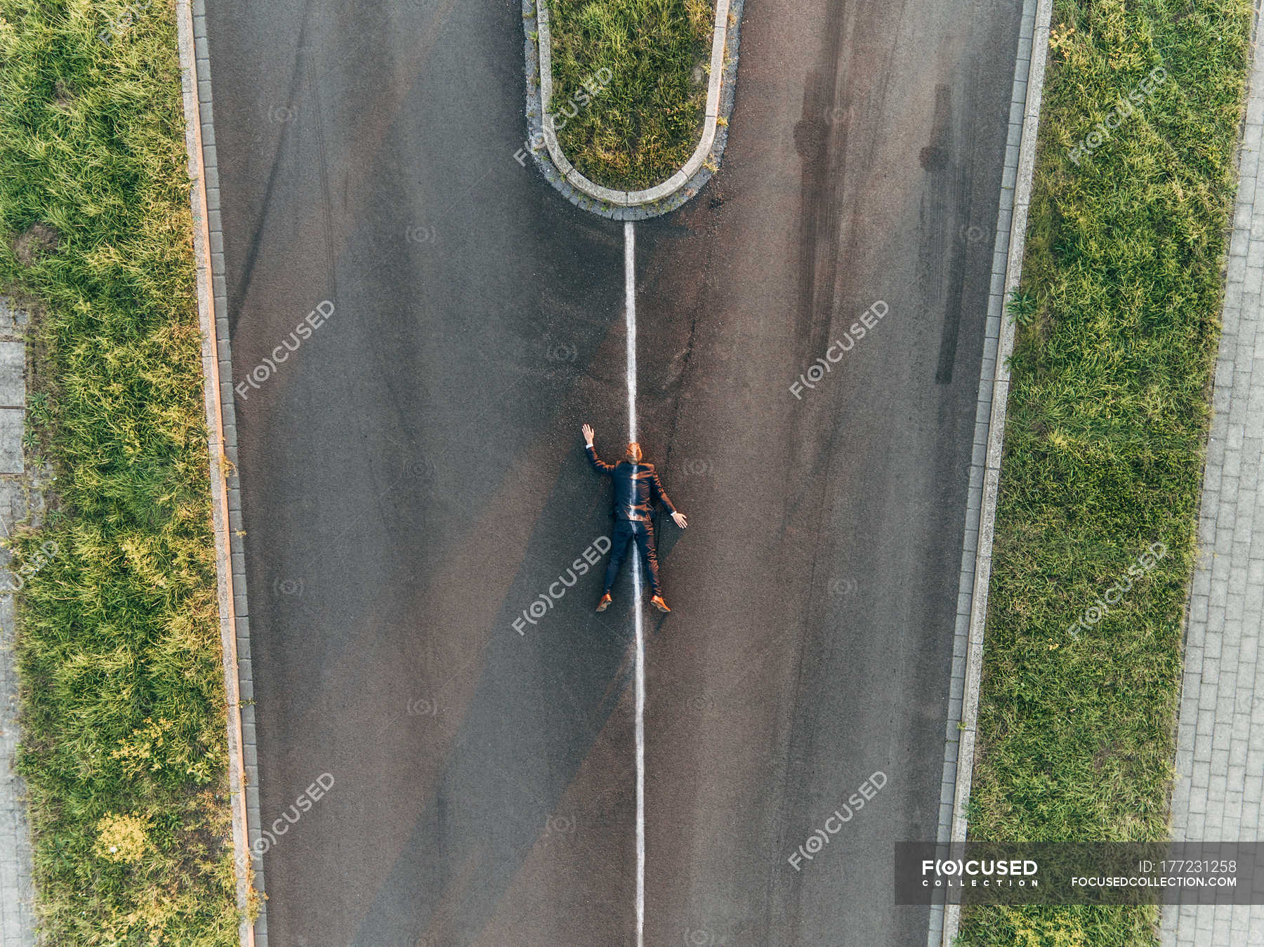 Run over businessman lying on road — death, dying - Stock Photo ...