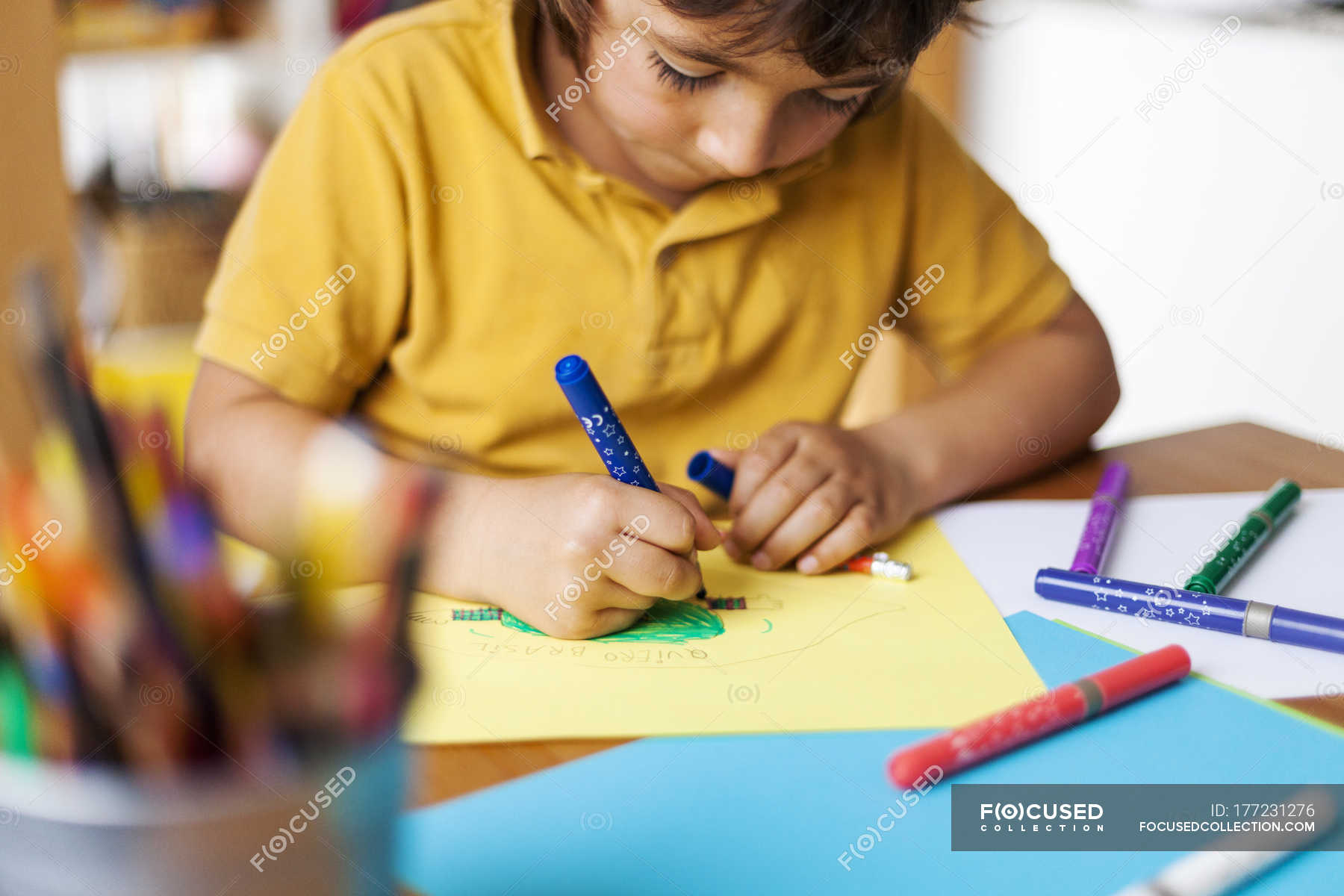 Little Boy Drawing On Yellow Paper Catalonia Sheet Of Paper Stock   Focused 177231276 Stock Photo Little Boy Drawing Yellow Paper 