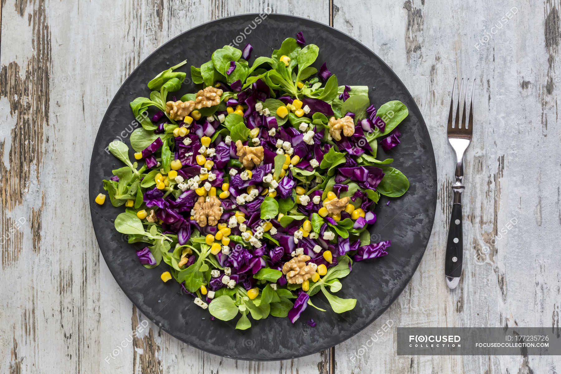 Salad With Lettuce Red Cabbage Corn And Feta Cheese On Plate Freshness Color Image Stock Photo 177235726