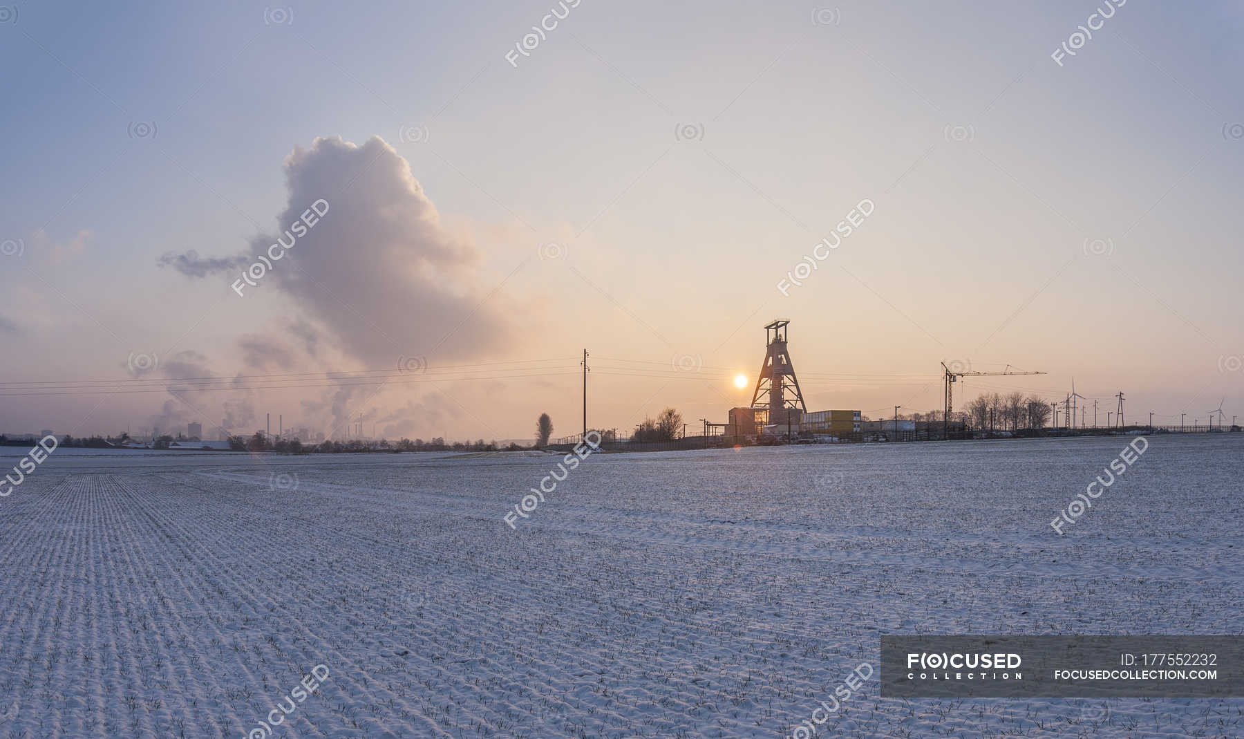 Germany Lower Saxony Salzgitter Iron Ore Mine Salzgitter Kloeckner Werke In The Background Field Cloud Stock Photo