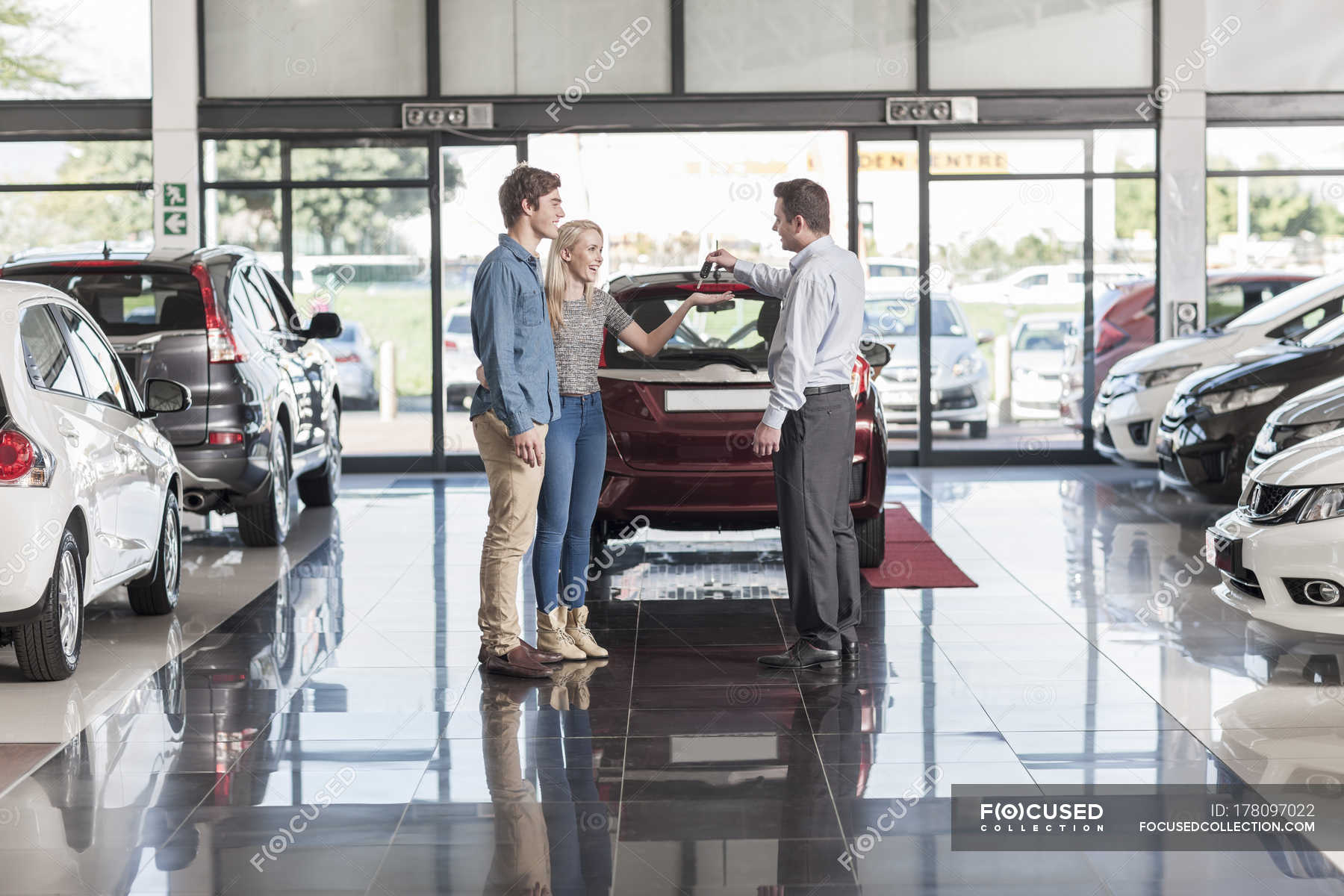 Key Car Dealership >> Car Dealer Giving Key To Clients 20 25 Years 20 30 Years Key Car Dealership >> Car Dealer Giving Key To Clients 20 25 Years 20 30 Years