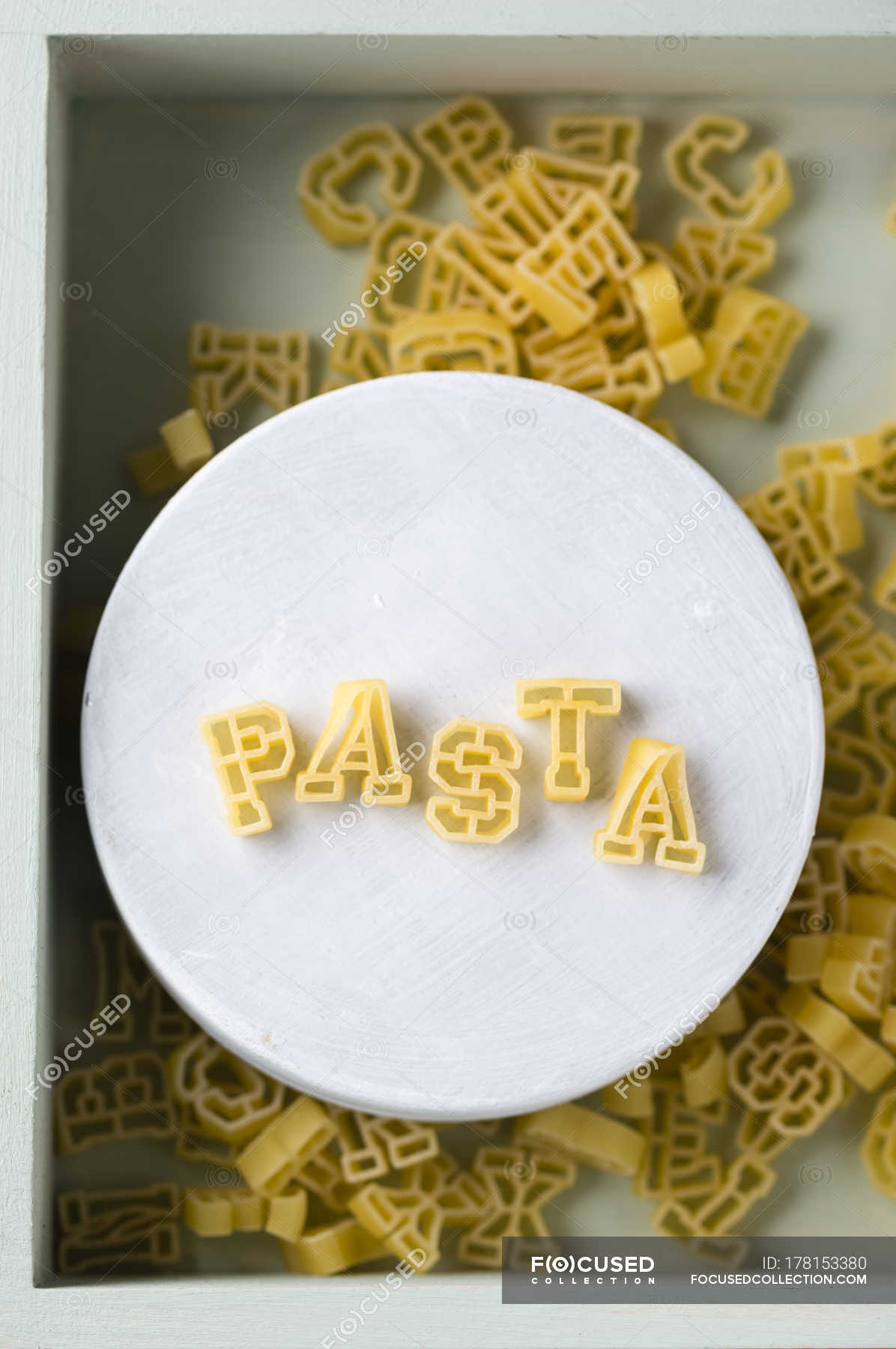 plate-with-pasta-letters-forming-the-word-pasta-elevated-view