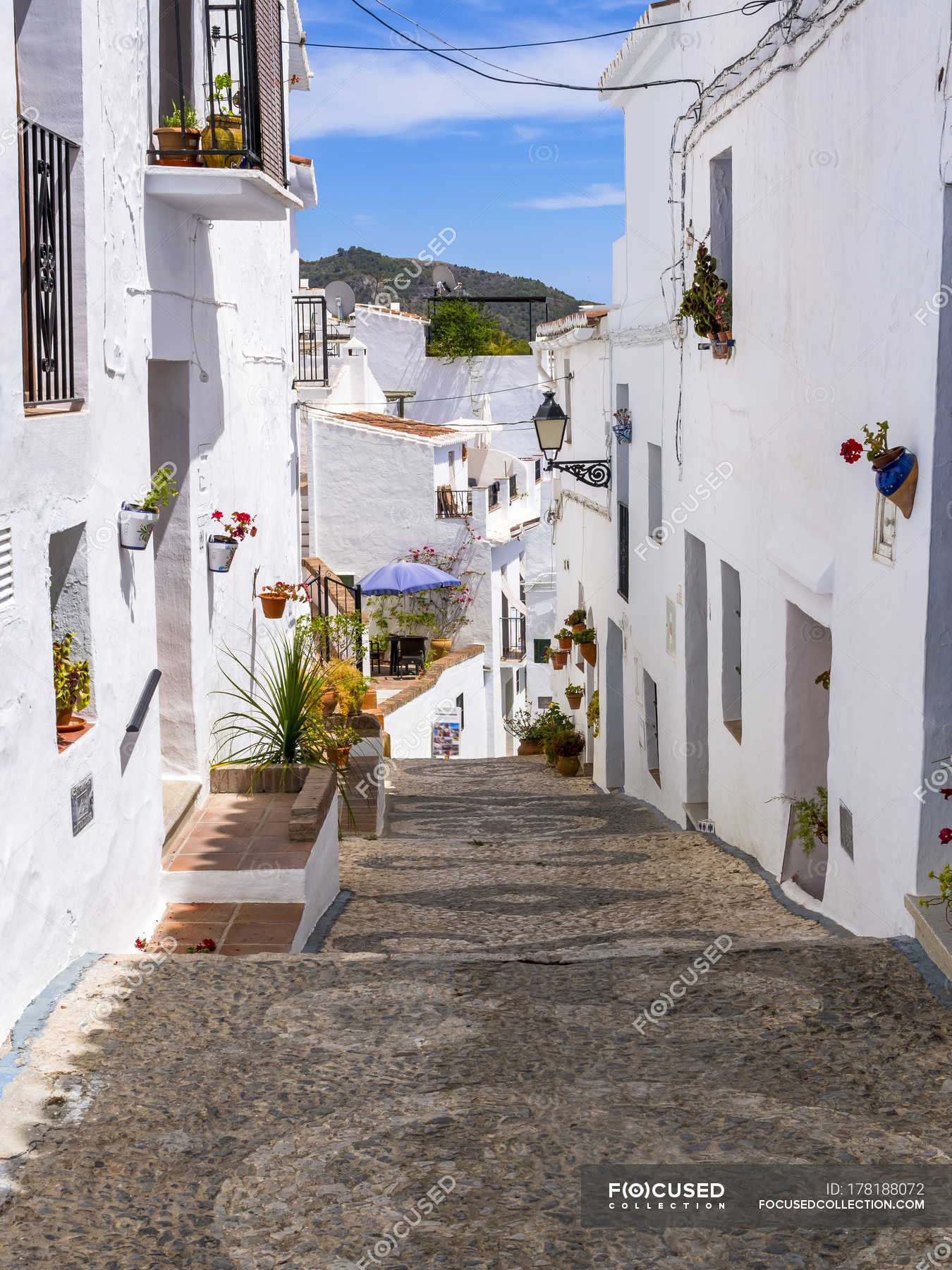 Spain Andalusia Frigiliana White Houses And Alleyway During Daytime View Outdoors Stock Photo