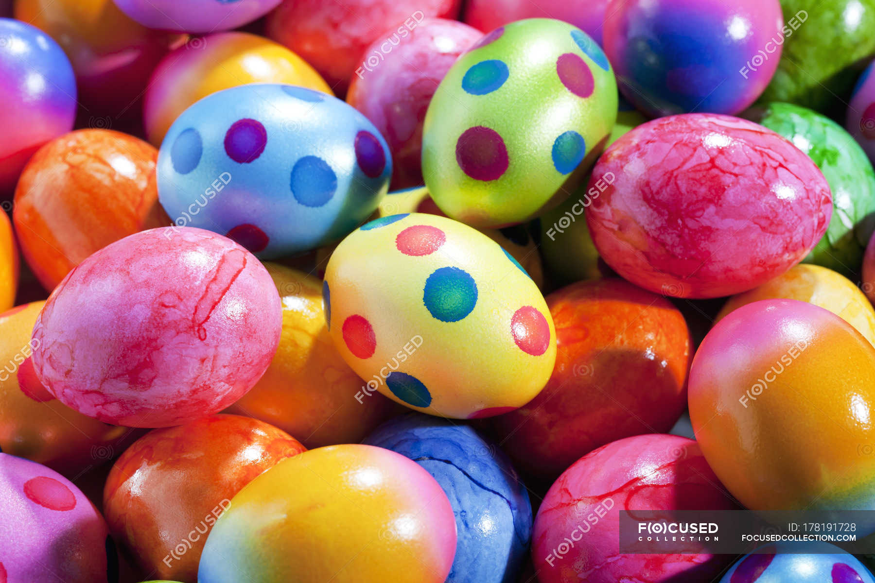 Close up of pile of coloured Easter eggs — Polka Dot, still life ...