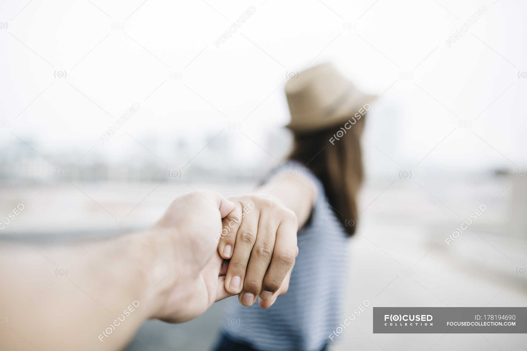 Couple Holding Hands View From Personal Perspective Stylish Hat Stock Photo