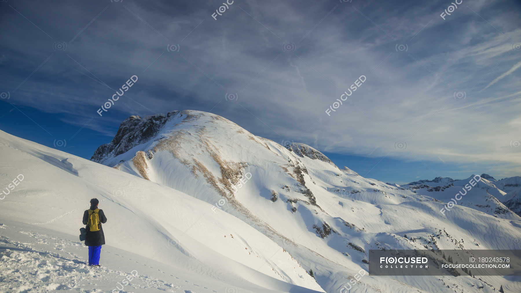 Germany, Allgaeu, Woman looking at mountain panorama with