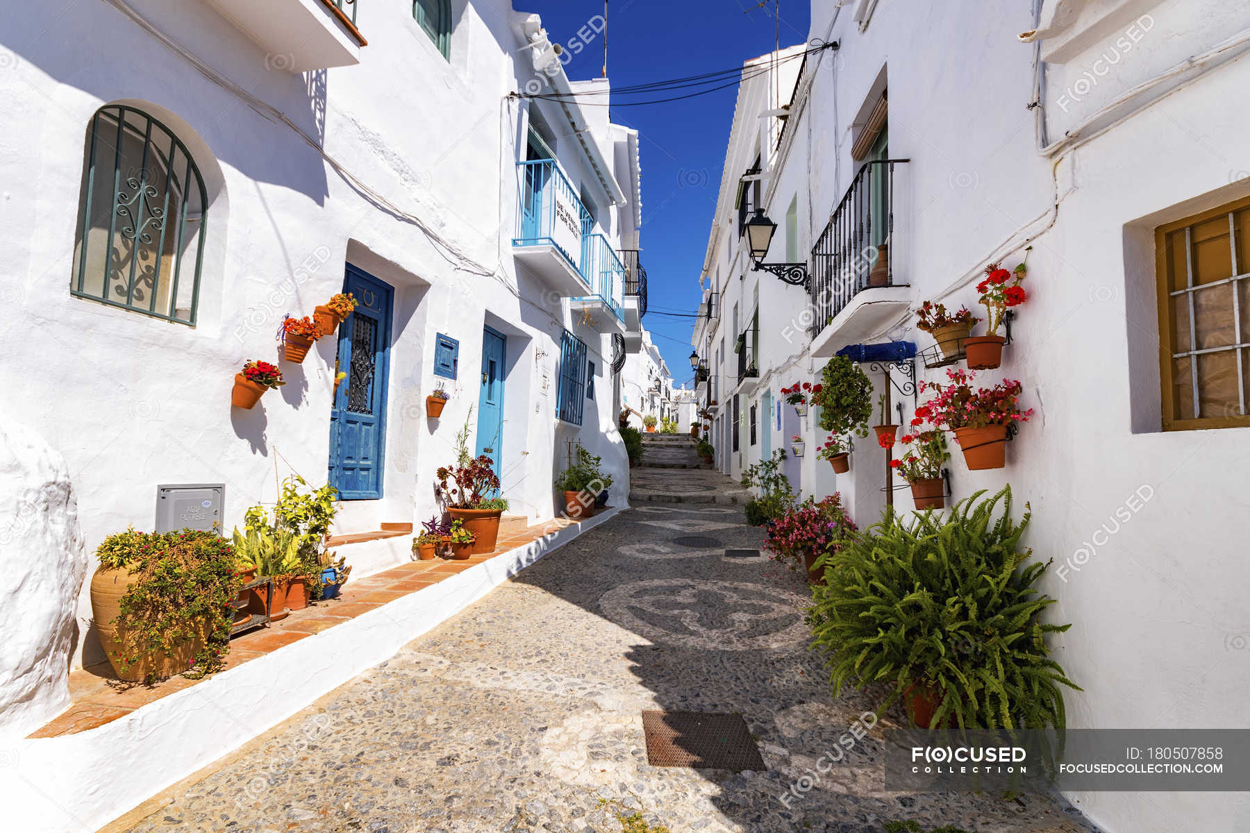 Spain Andalusia Frigiliana Alleyway During Daytime Architecture Backdrop Stock Photo