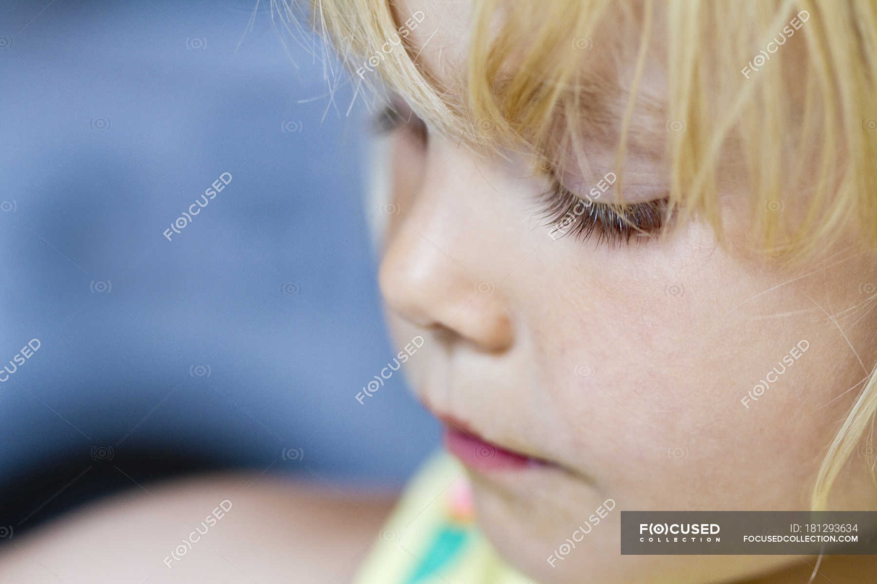 girl looking down crying