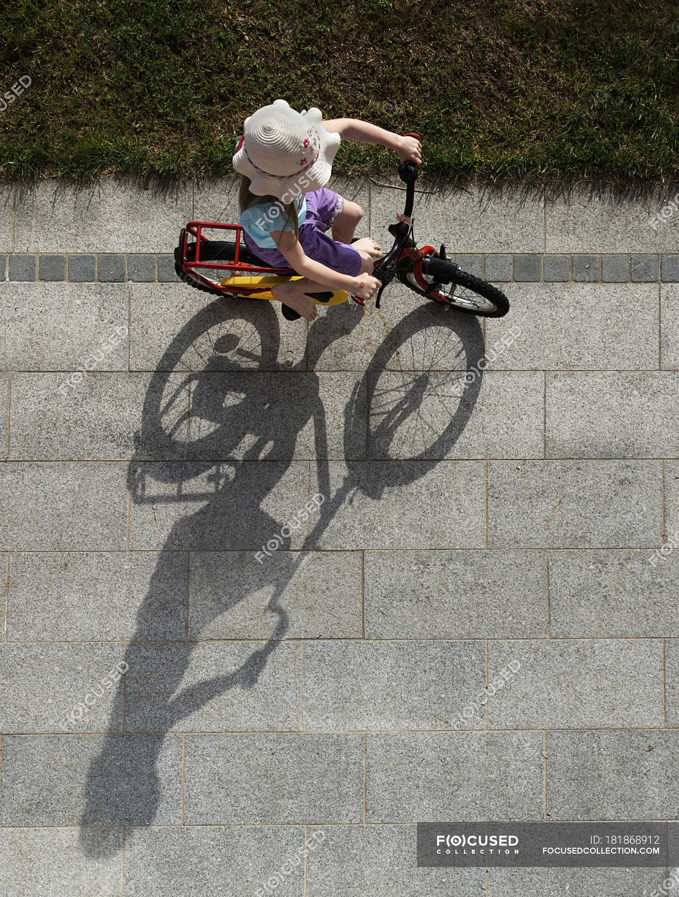 little girl on bicycle