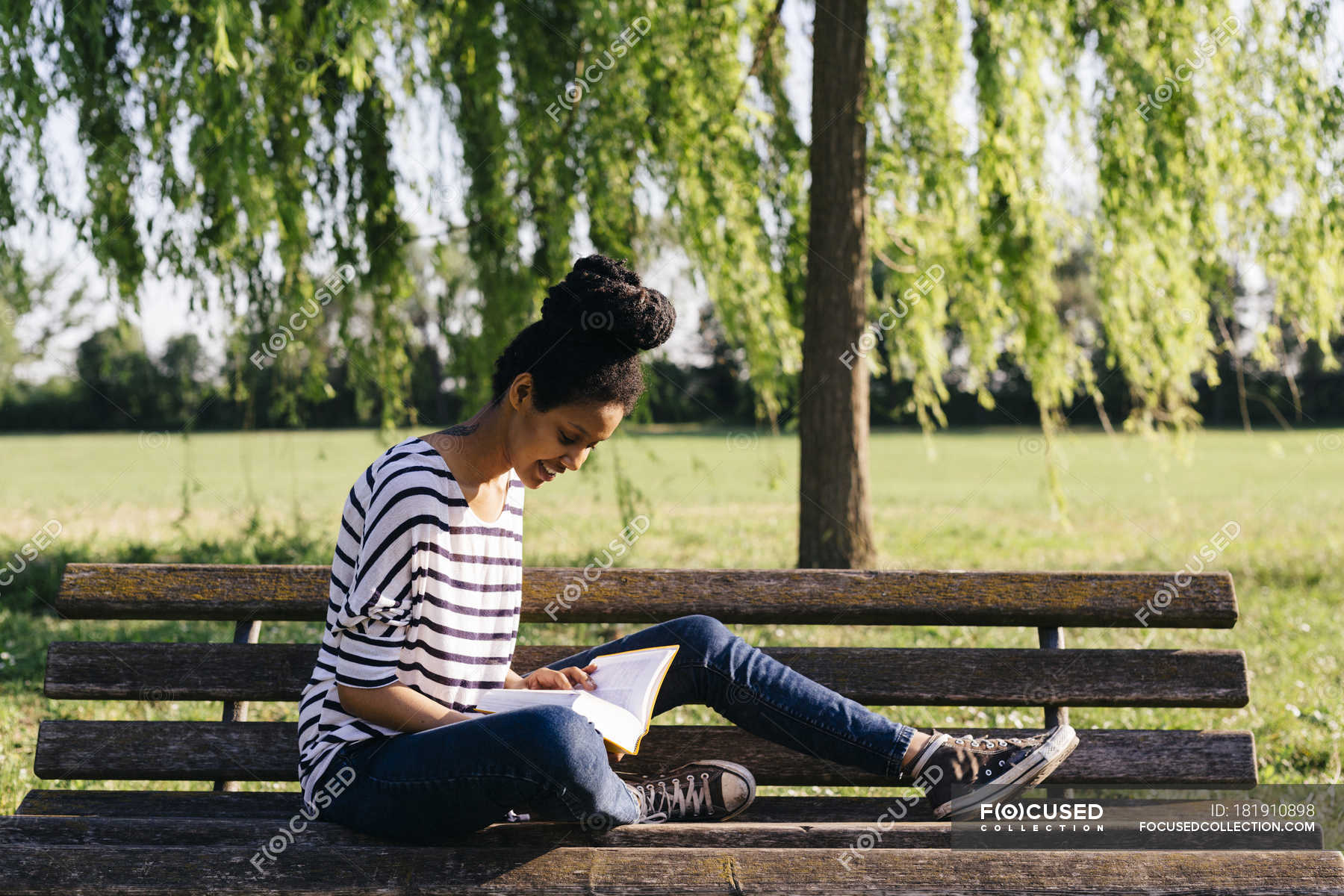 people sitting on a park bench