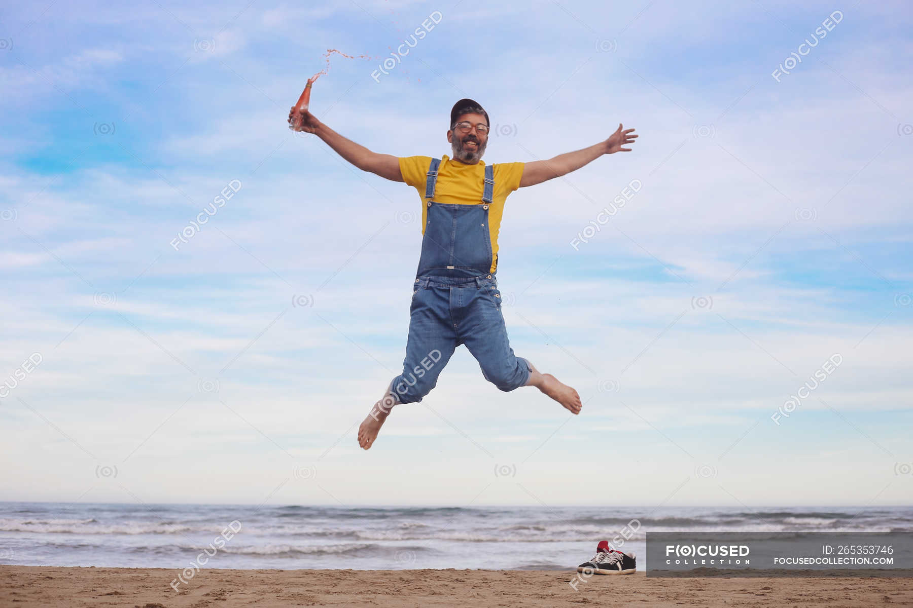 very happy man jumping
