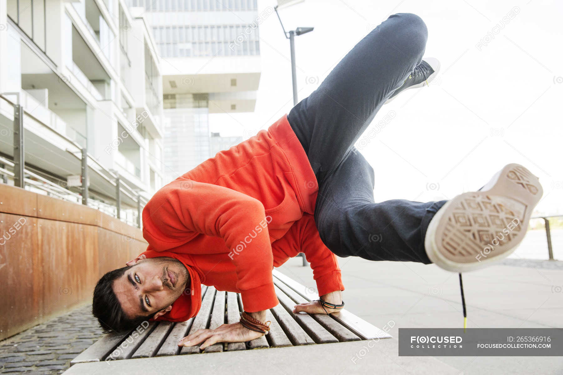 Portrait Of Young Man Practicising Breakdance City Looking At Camera Stock Photo 265366916