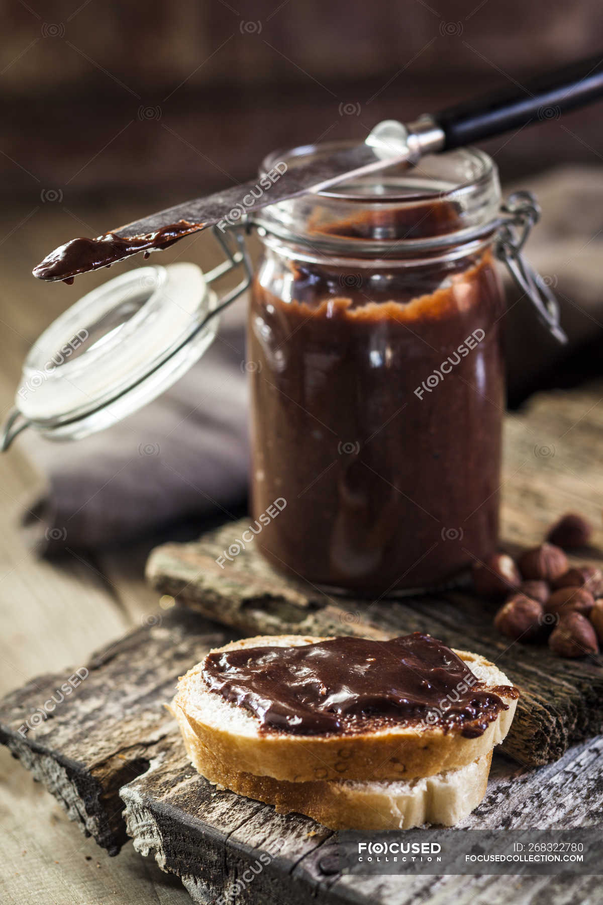 Homemade chocolate spread on bread slice — chocolate cream, fabric