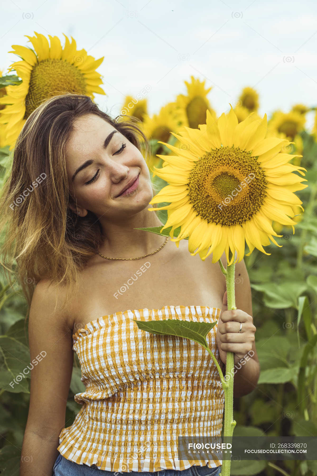 Girl with a sunflower Digital Art & Collectibles