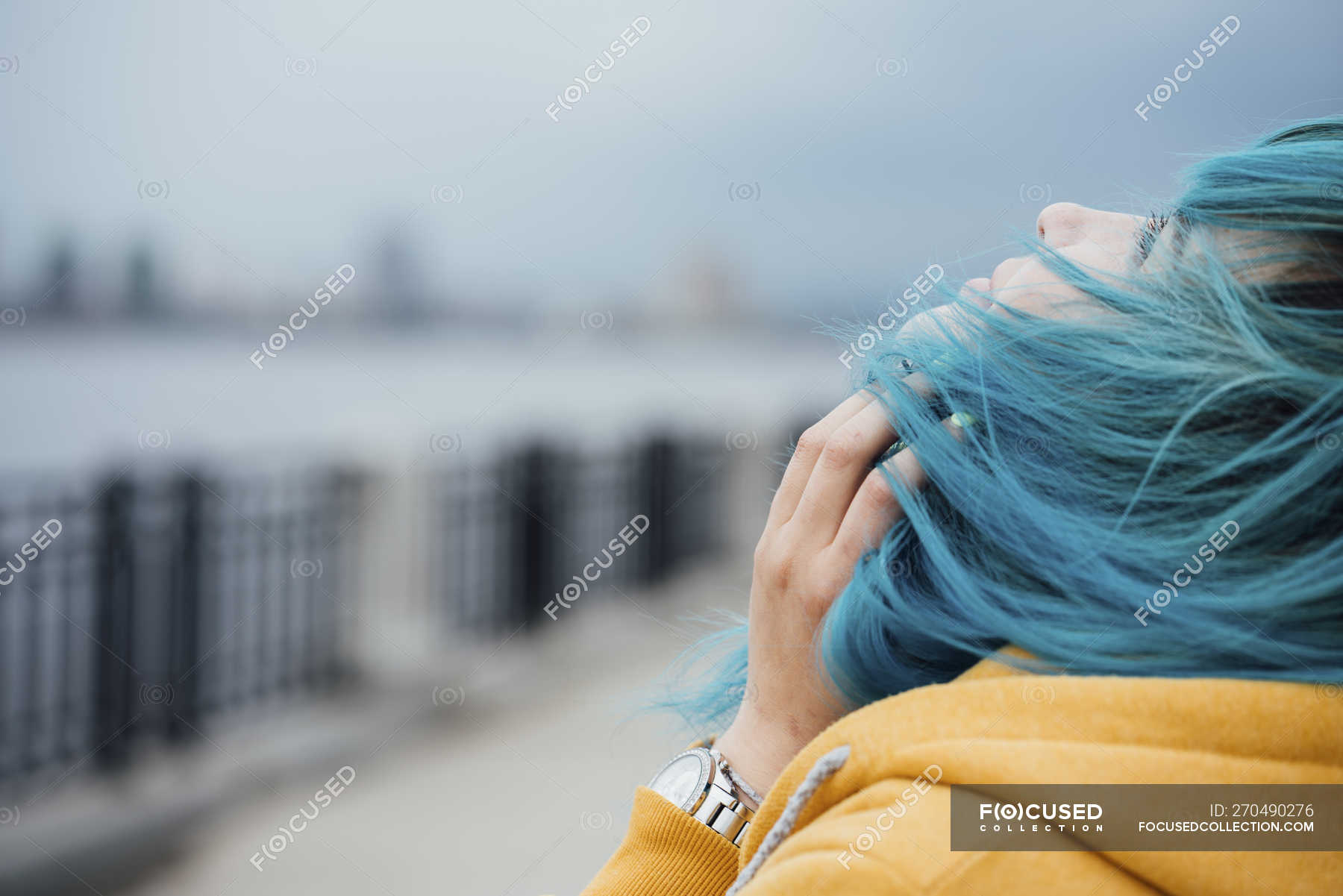 3. Middle-aged woman with dyed blue hair - wide 4