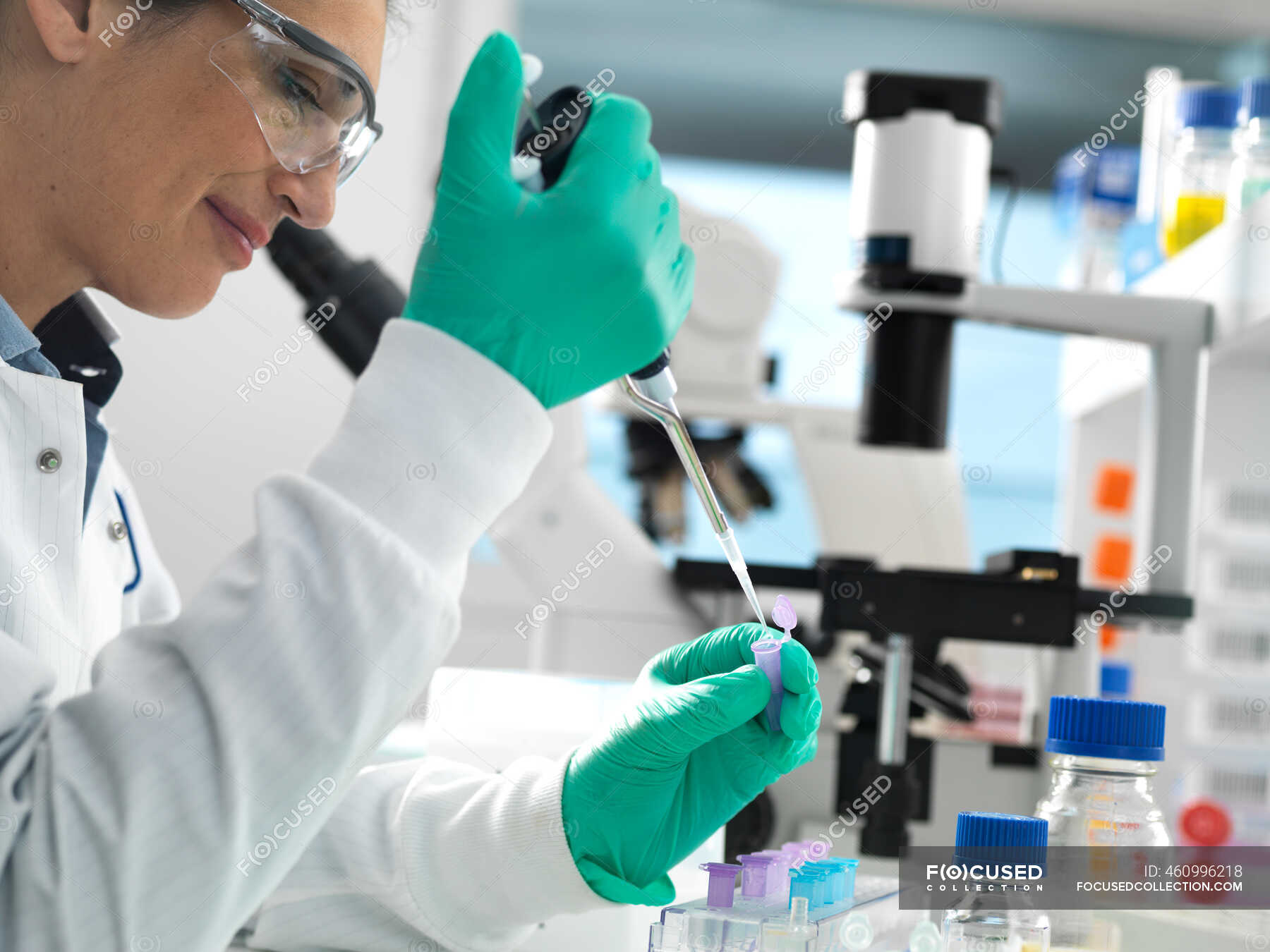 Biotech Research, Scientist pipetting sample into a vial ready for