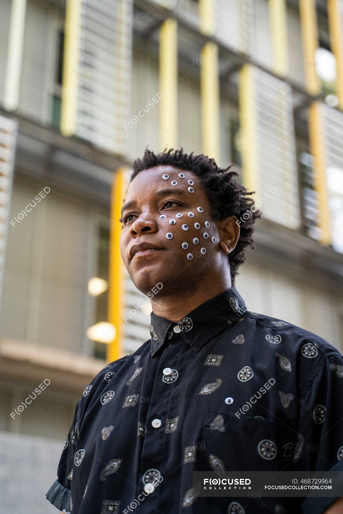 Man with wickly eyes on his face — black, people - Stock Photo | #468729964