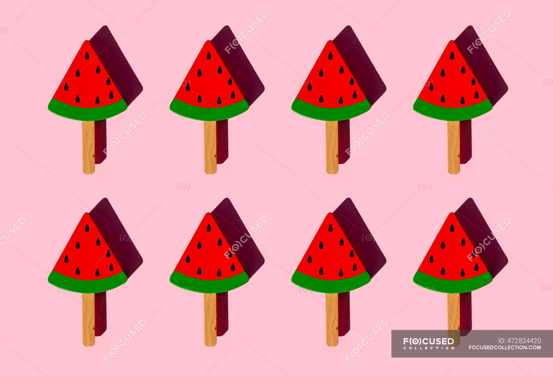 rows-of-popsicle-sticks-with-toy-watermelon-slices-nobody-indoors-stock-photo-472824420