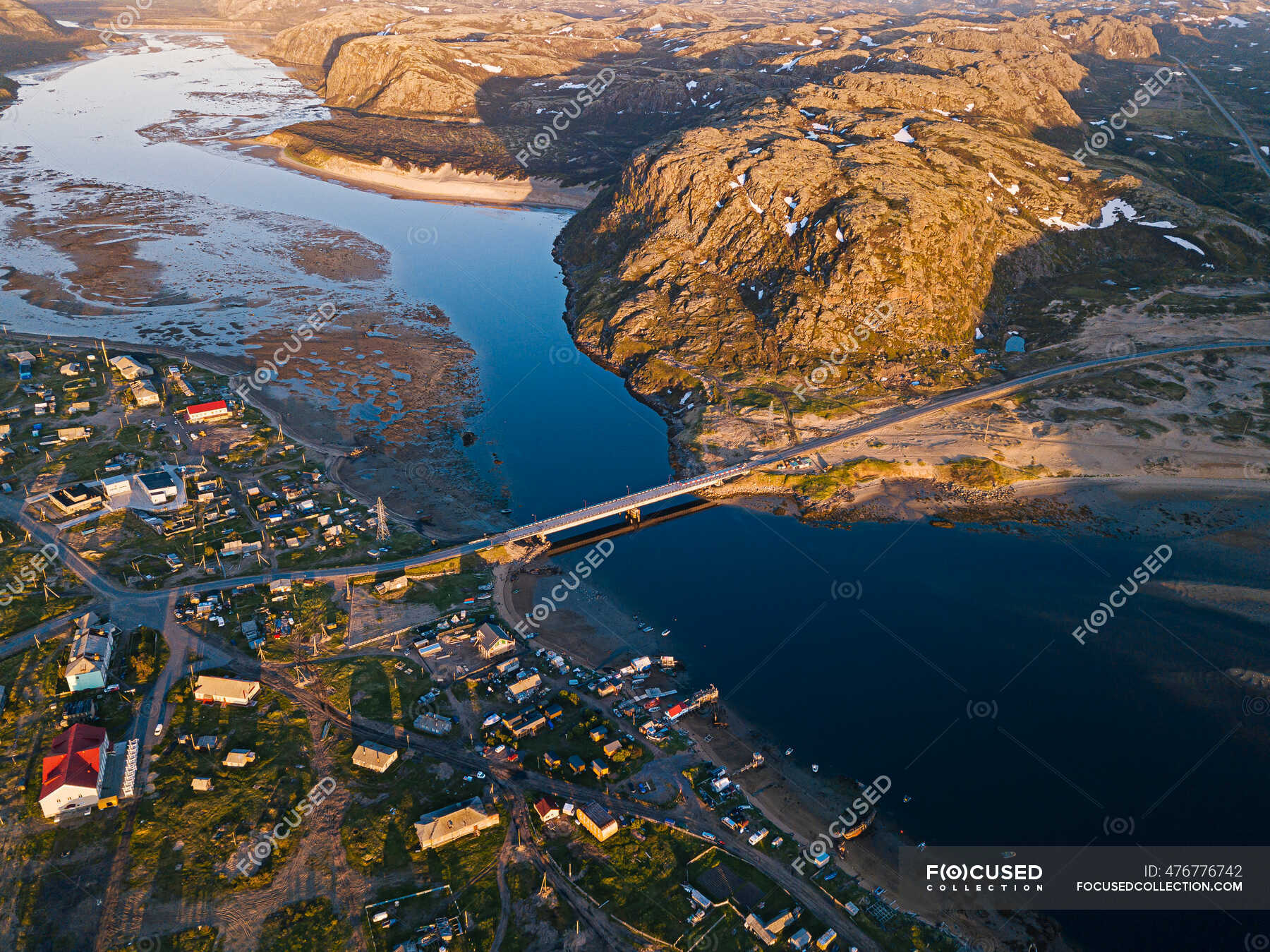 Russia, Murmansk Oblast, Teriberka, Aerial view of village on shore of