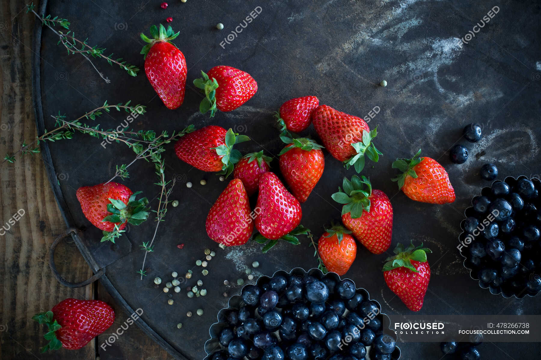 Berries and strawberries. ripe strawberry, raspberry, blackberry,  raspberries and mint in a black background. top — fruit, enjoying - Stock  Photo | #478266738