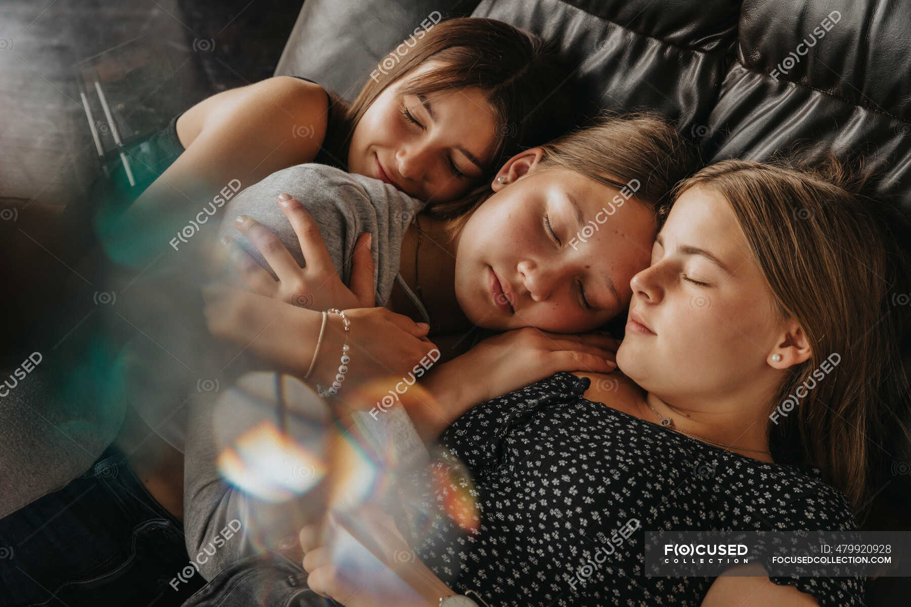 Friends sleeping on sofa bed at home — 12 13 Years, weekend Stock