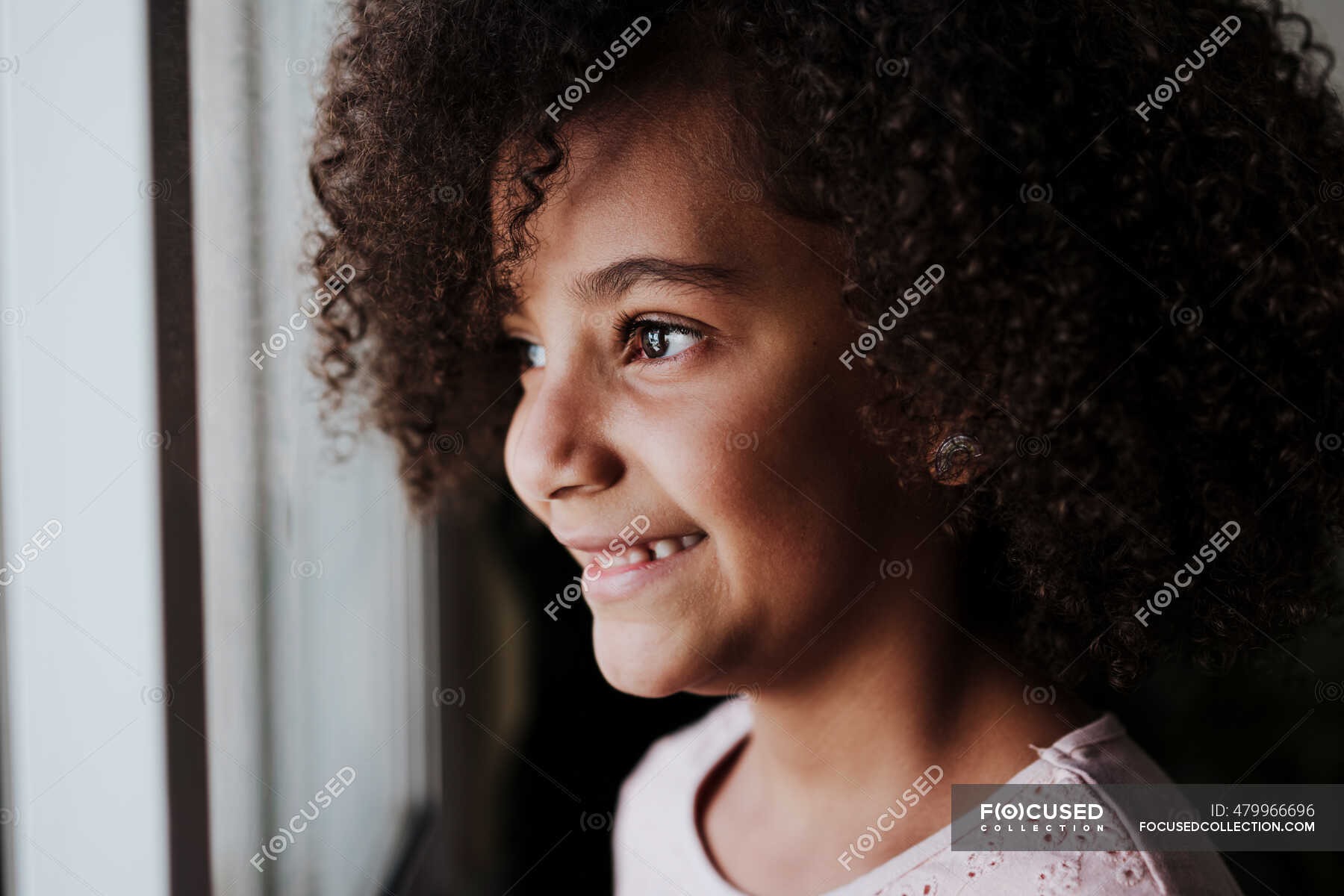 Smiling girl looking through window at home — standing, people - Stock ...