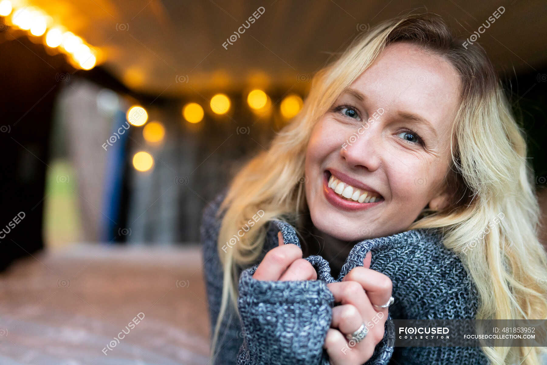 happy-woman-lying-on-bed-in-camper-van-caucasian-lifestyle-stock